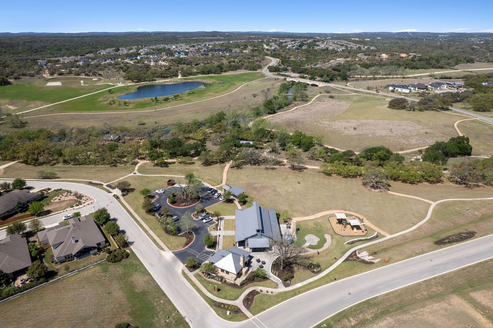 306 Bridge Water Loop Dripping Springs, TX 78620 - Photo 38 of 40 an aerial view of a house with outdoor space