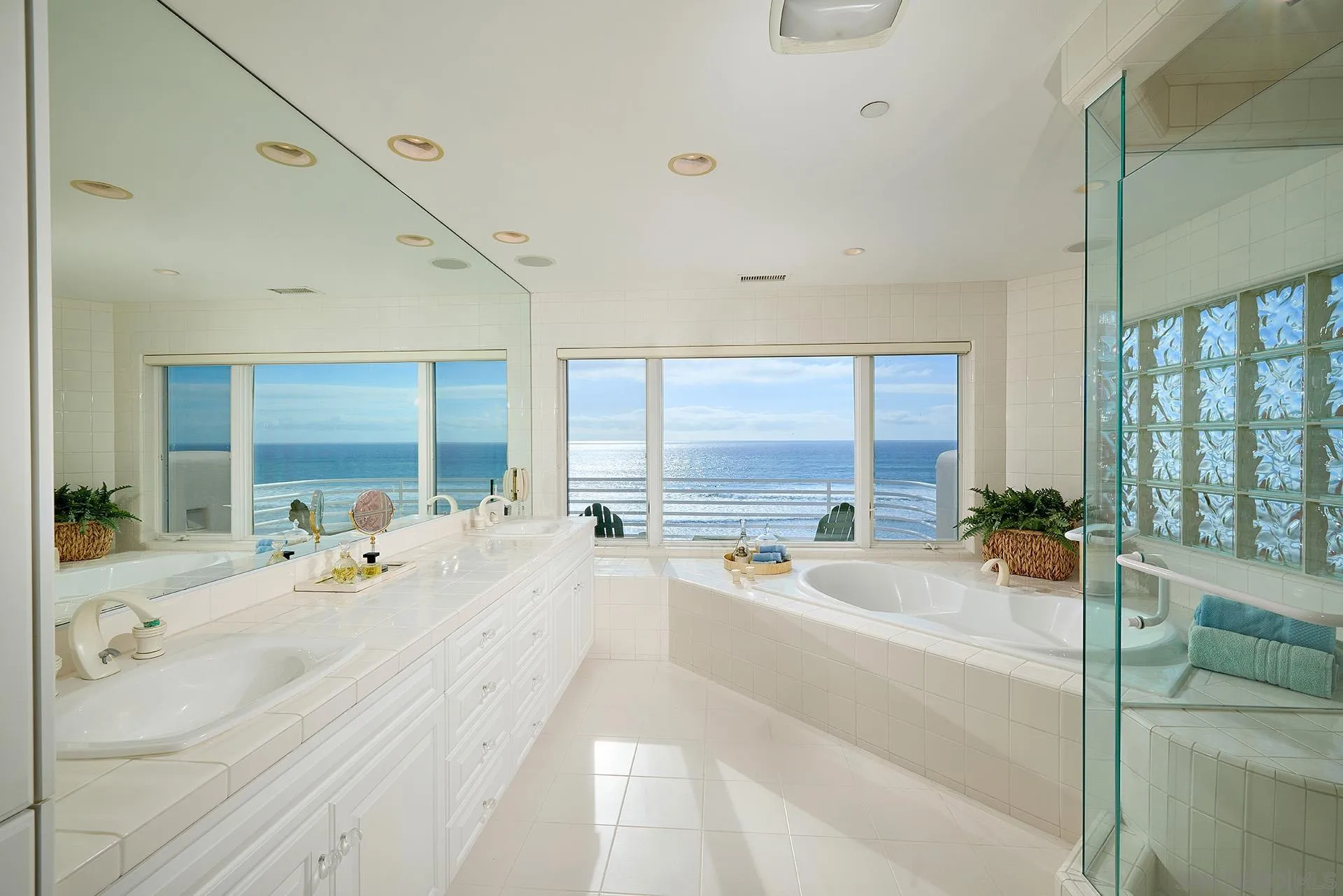1630 Neptune Avenue Encinitas, CA 92024 - Photo 11 of 25 a large white room with a large window and furniture