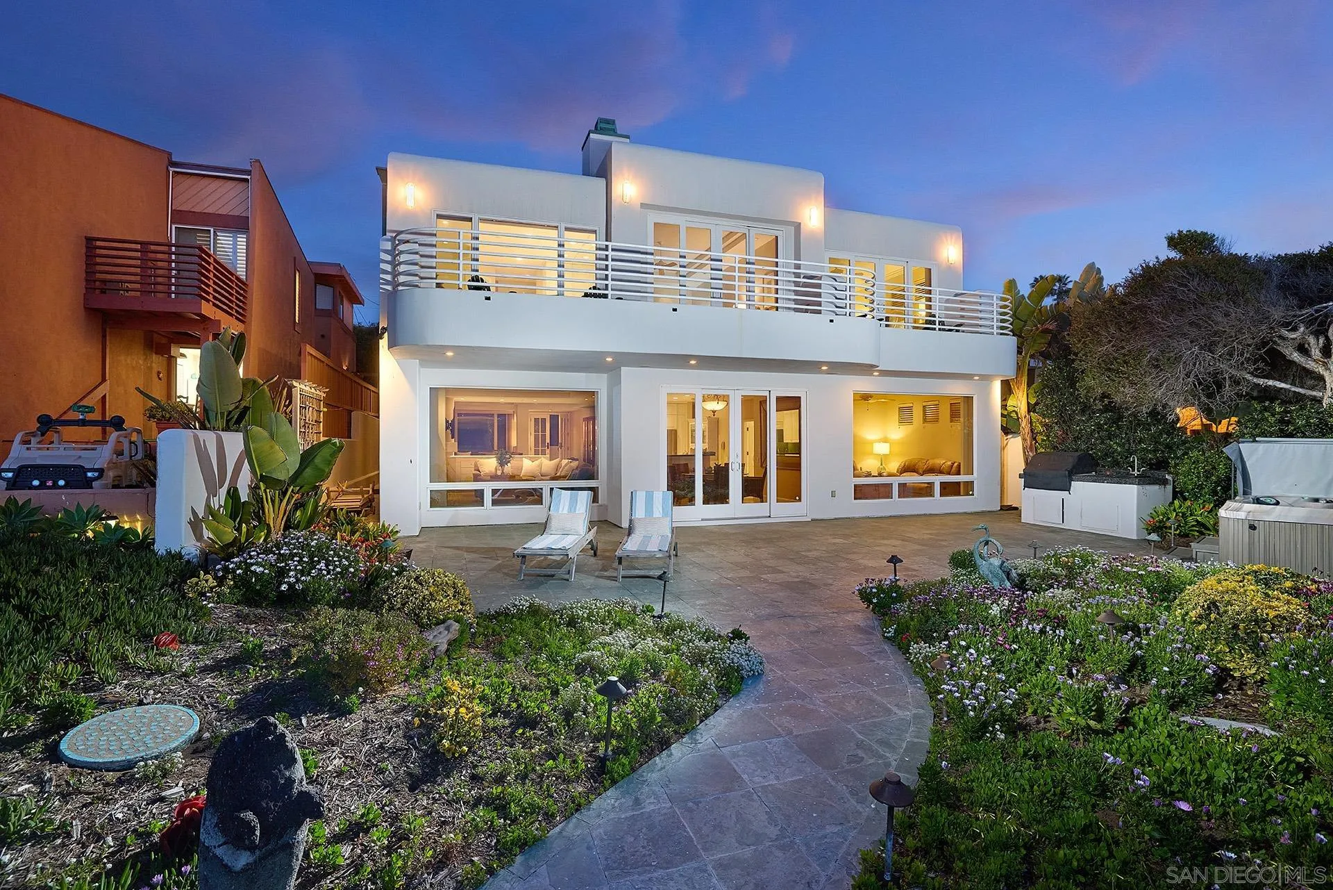 1630 Neptune Avenue Encinitas, CA 92024 - Photo 25 of 25 a front view of a house with garden