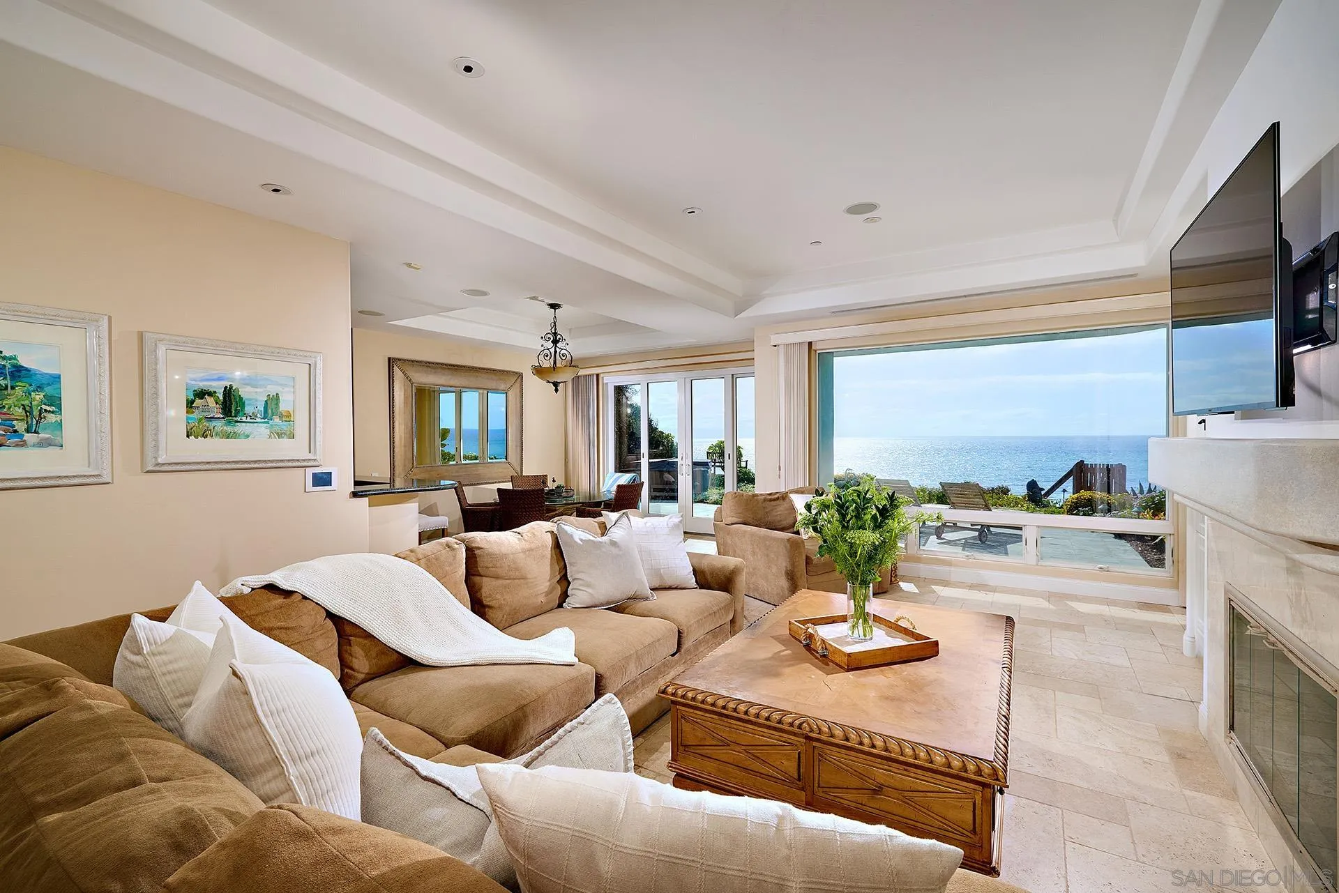1630 Neptune Avenue Encinitas, CA 92024 - Photo 4 of 25 a living room with furniture kitchen view and a large window