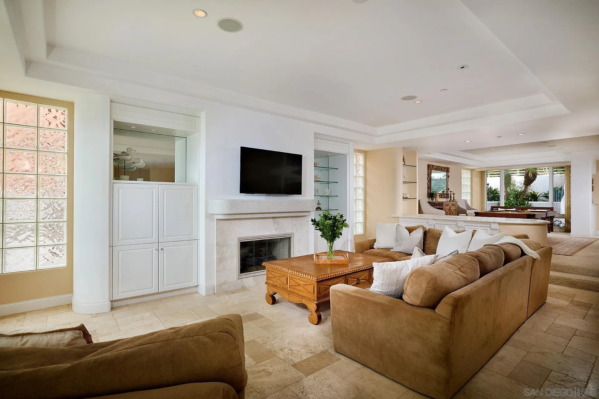 1630 Neptune Avenue Encinitas, CA 92024 - Photo 5 of 25 a living room with furniture and a fireplace