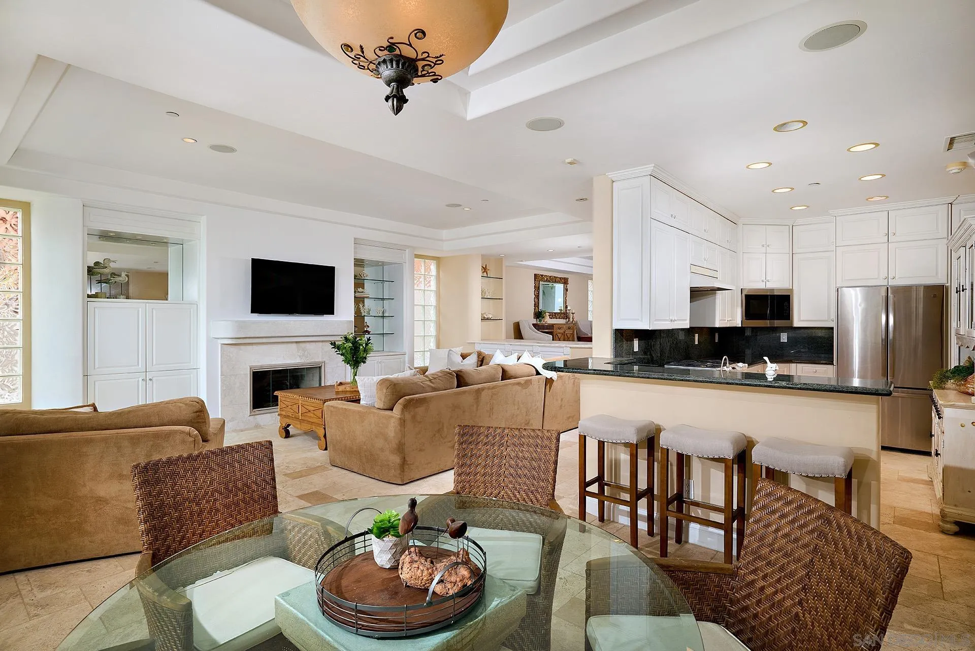 1630 Neptune Avenue Encinitas, CA 92024 - Photo 6 of 25 a living room with furniture and a fireplace