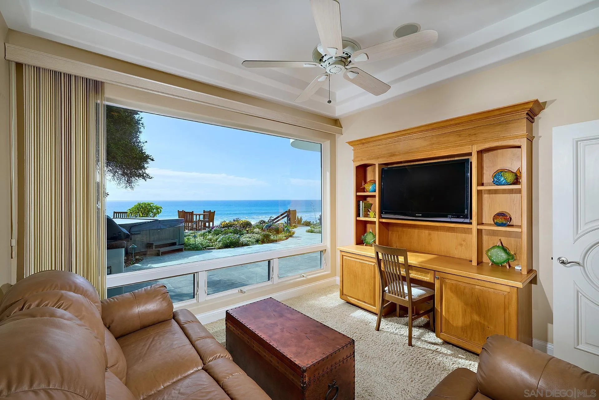 1630 Neptune Avenue Encinitas, CA 92024 - Photo 9 of 25 a living room with furniture and a flat screen tv
