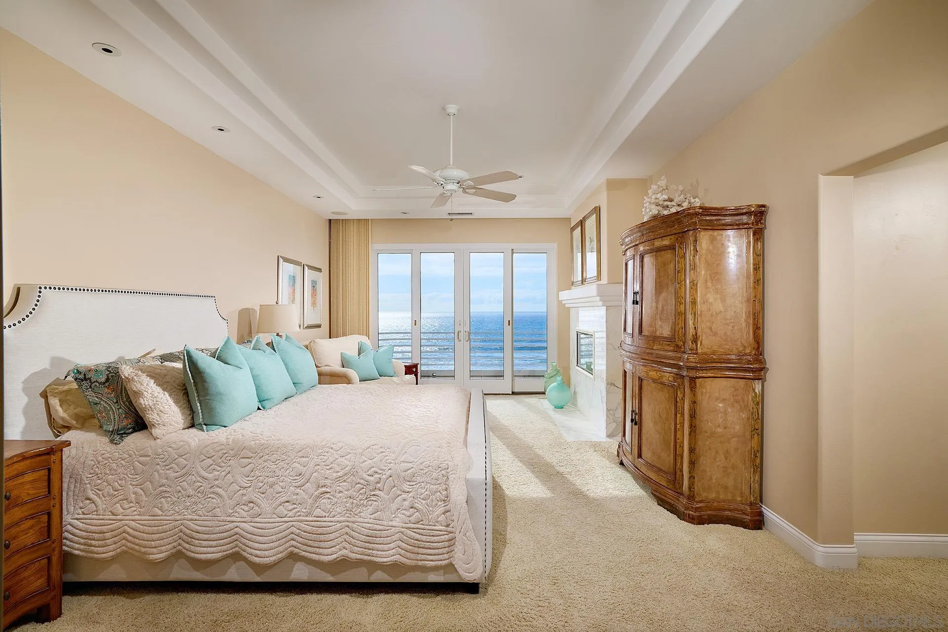 1630 Neptune Avenue Encinitas, CA 92024 - Photo 10 of 25 a living room with a bed furniture and floor to ceiling window