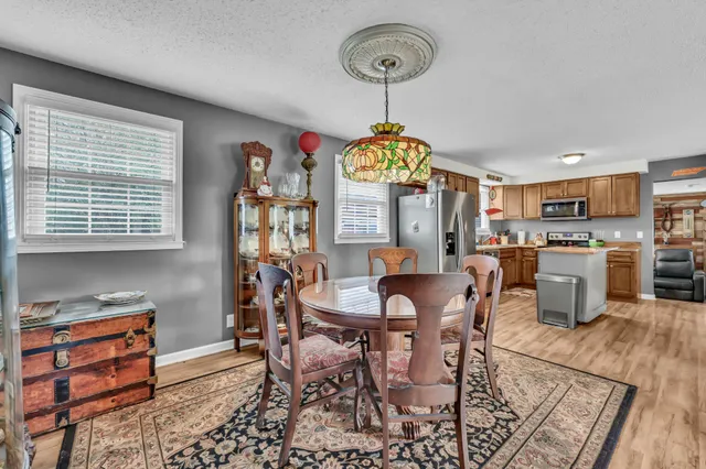 a view of a dining room with furniture