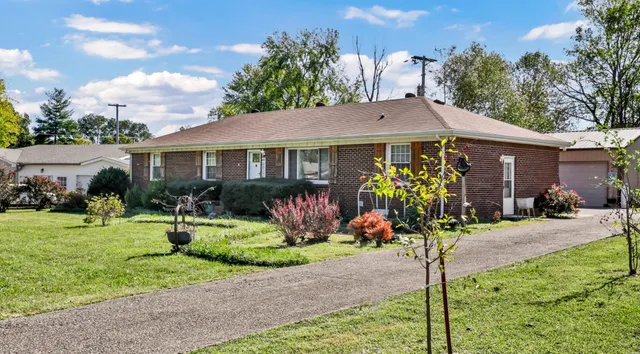 a view of a house with a big yard