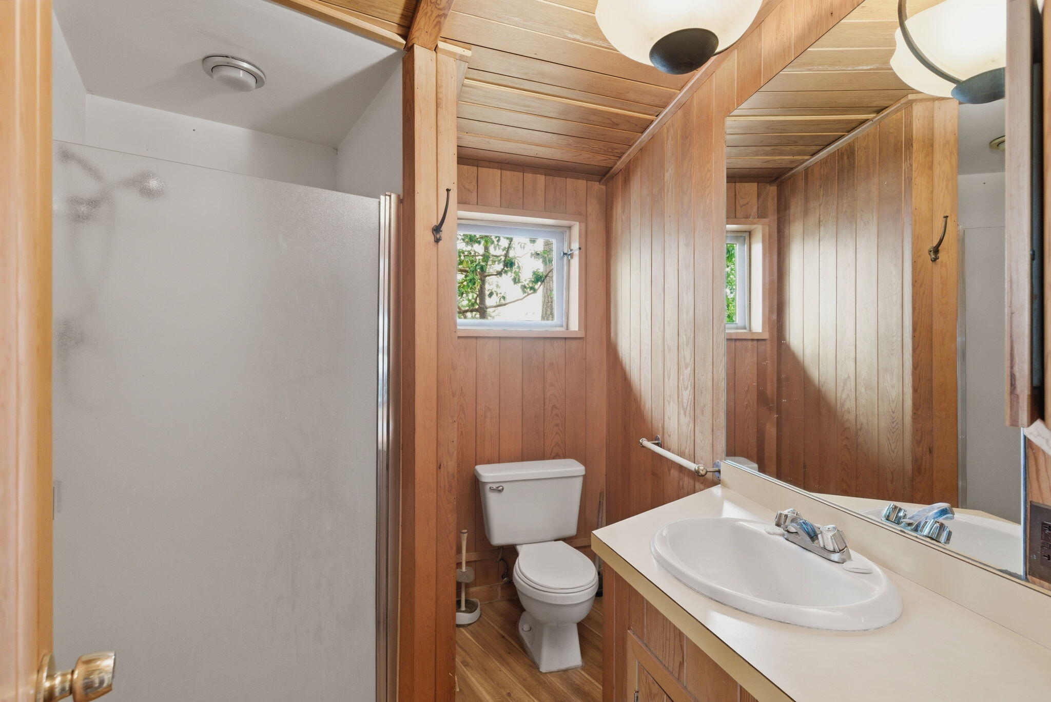 9595 Sterling Creek Road Jacksonville, OR 97530 - Photo 29 of 76 a bathroom with a sink a toilet and shower