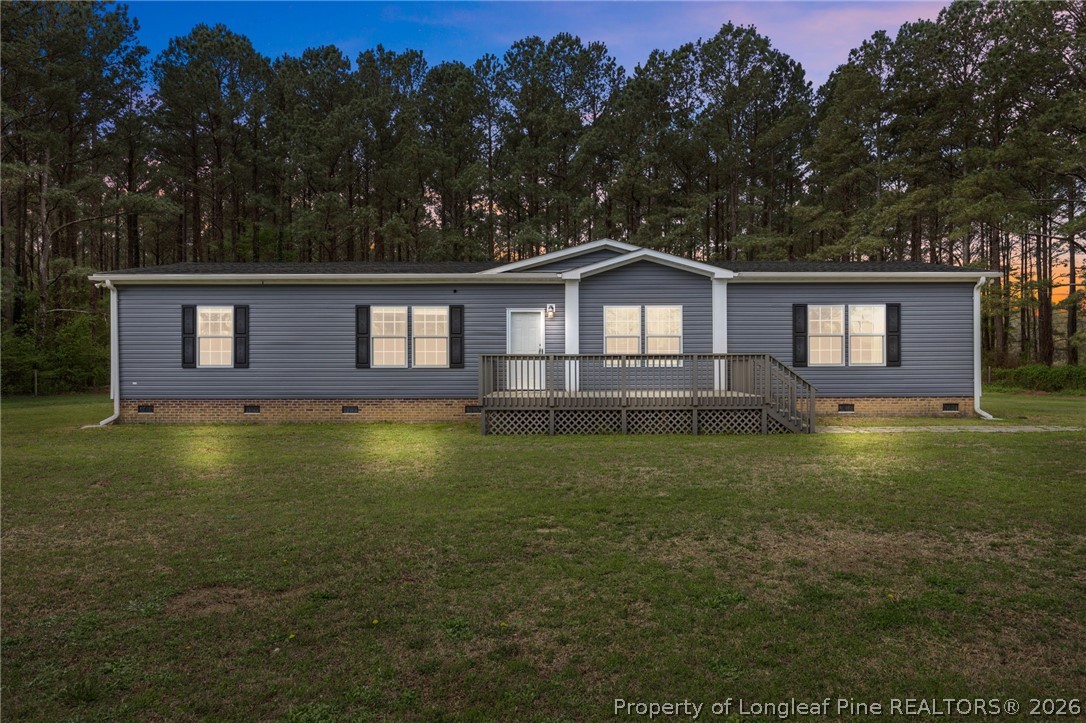 2252 Old Stage Road South Erwin, NC 28339 - Photo 1 of 47 a front view of a house with a yard