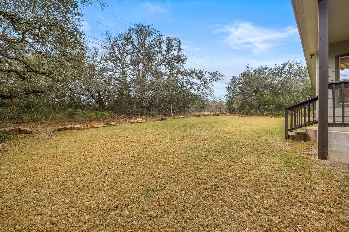 103 Kendall Road Spicewood, TX 78669 - Photo 28 of 37 a view of yard with trees
