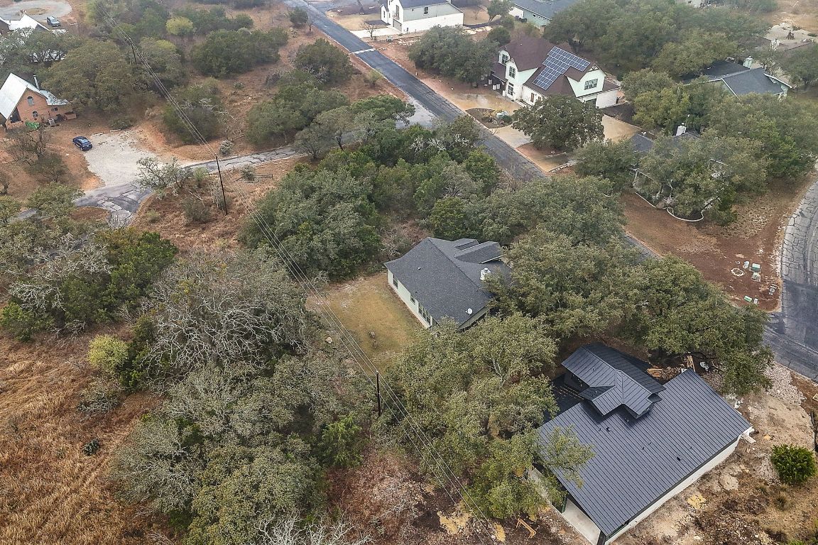 103 Kendall Road Spicewood, TX 78669 - Photo 32 of 37 an aerial view of residential house with outdoor space