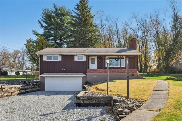 a view of a house with a swimming pool