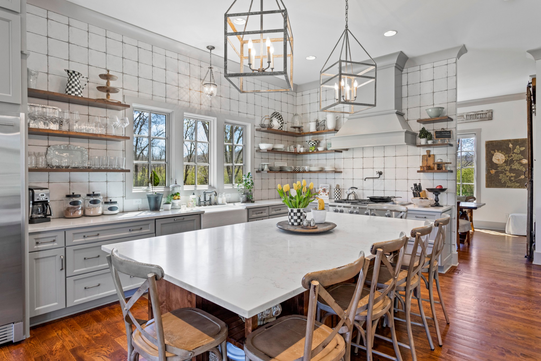 3330 Bailey Road Franklin, TN 37064 - Photo 11 of 37 a kitchen with stainless steel appliances granite countertop a stove a sink and a wooden cabinets