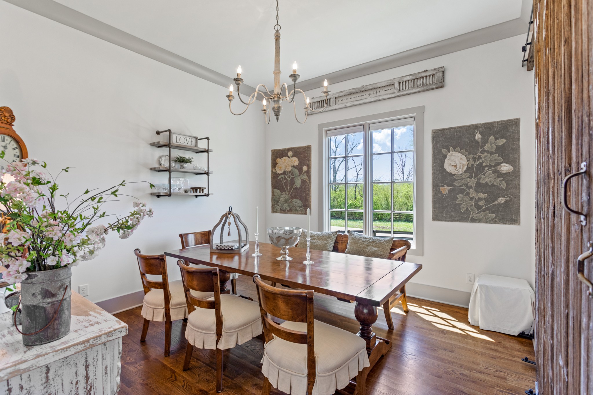 3330 Bailey Road Franklin, TN 37064 - Photo 14 of 37 a dining room with furniture a chandelier and wooden floor