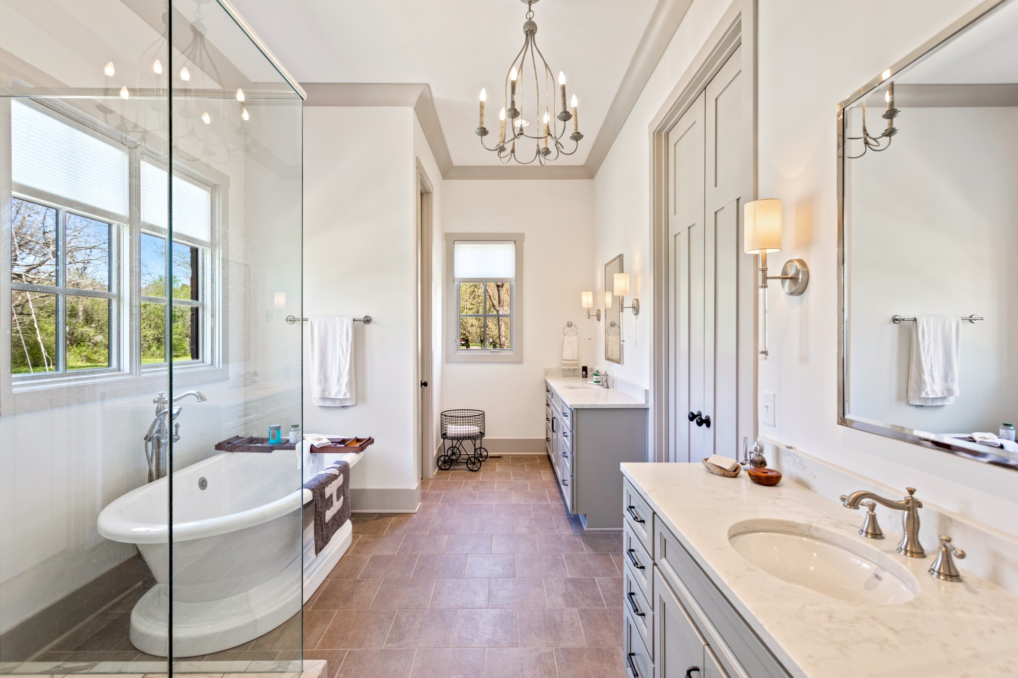 3330 Bailey Road Franklin, TN 37064 - Photo 17 of 37 a bathroom with a sink a large mirror and a bathtub