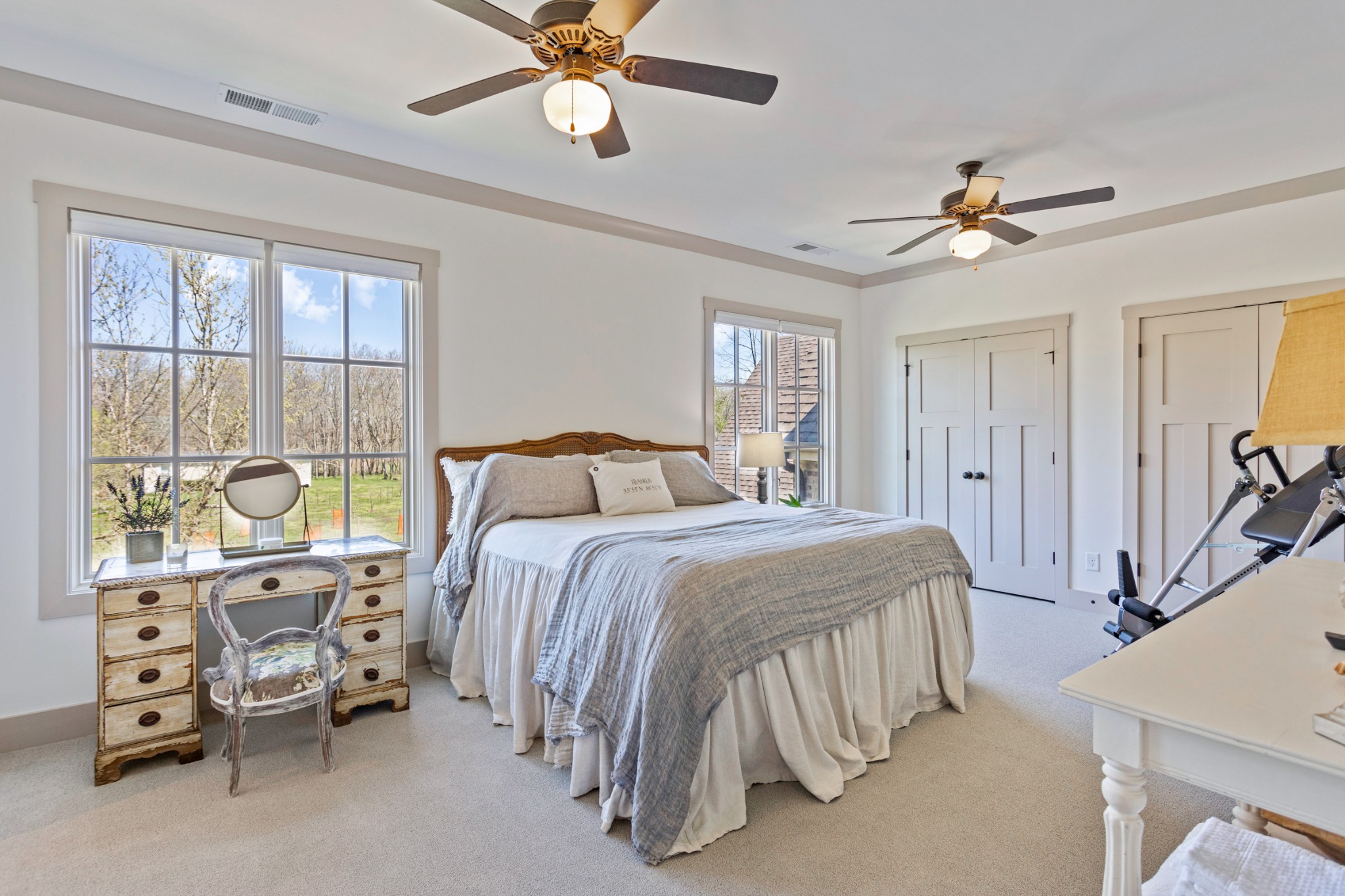 3330 Bailey Road Franklin, TN 37064 - Photo 29 of 37 a bedroom with a bed and a chandelier