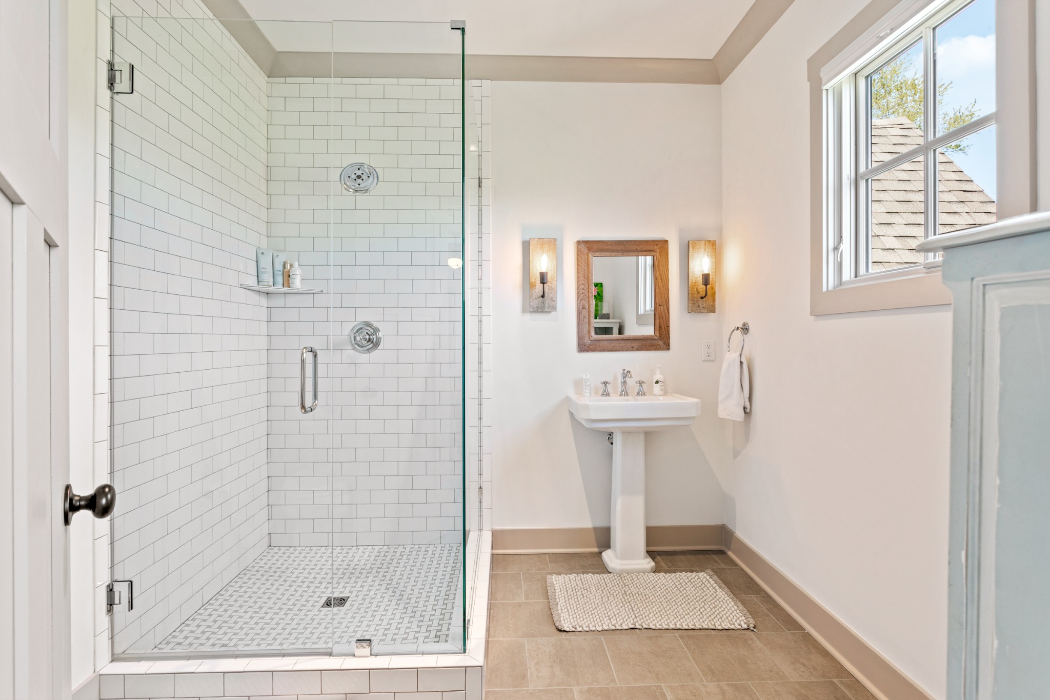 3330 Bailey Road Franklin, TN 37064 - Photo 30 of 37 a bathroom with a sink a mirror and a shower