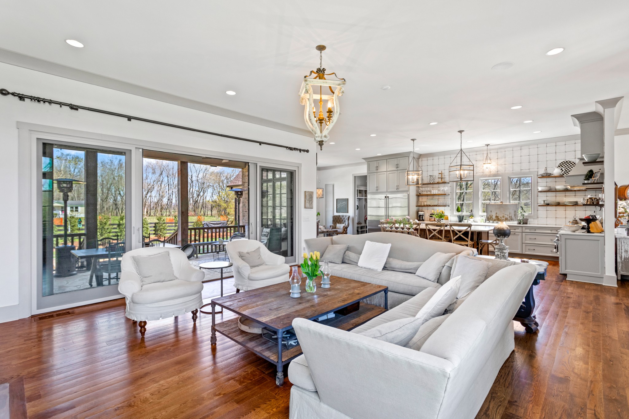 3330 Bailey Road Franklin, TN 37064 - Photo 7 of 37 a living room with furniture floor to ceiling window and wooden floor