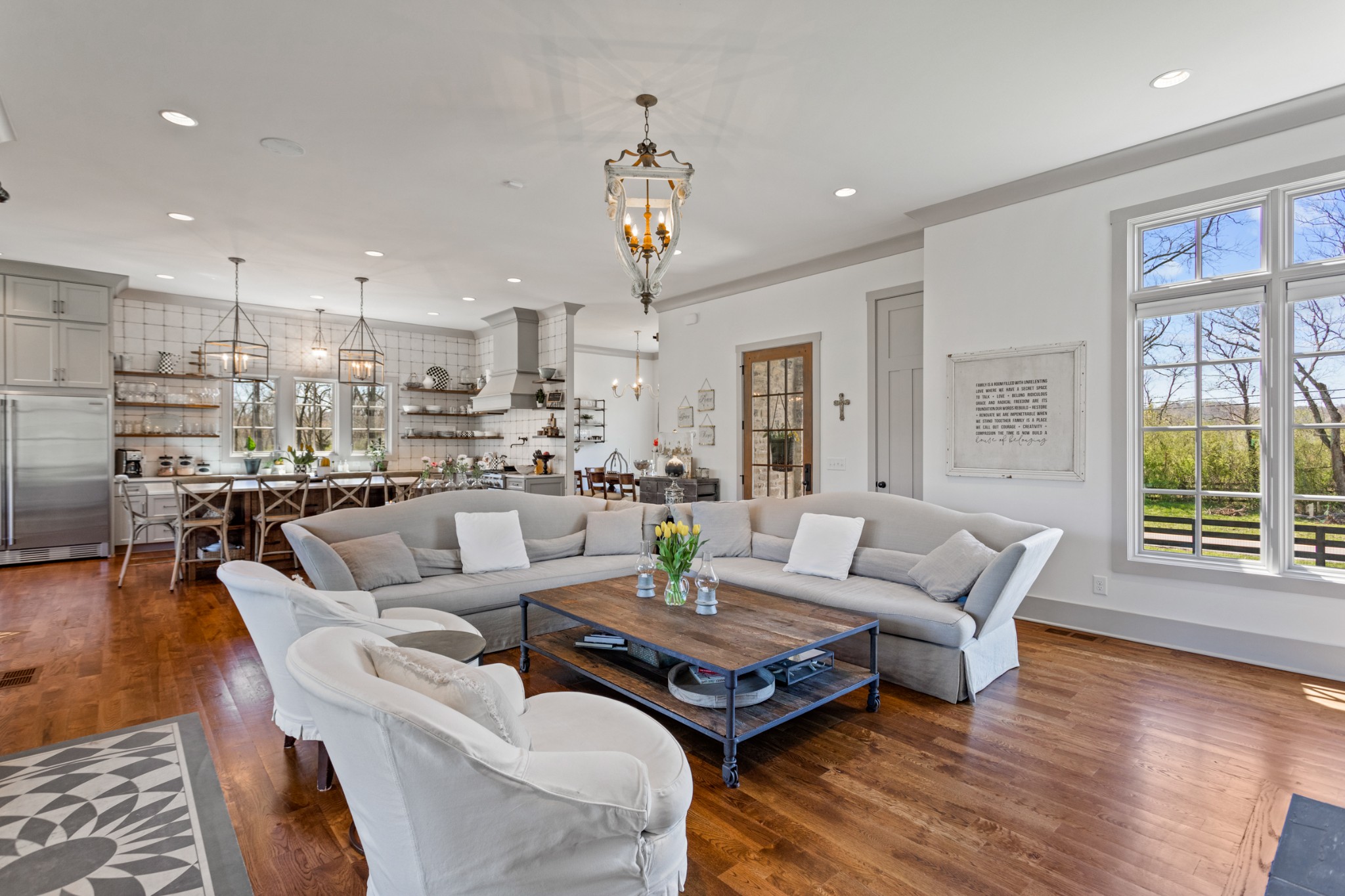 3330 Bailey Road Franklin, TN 37064 - Photo 8 of 37 a living room with furniture dining table and a chandelier
