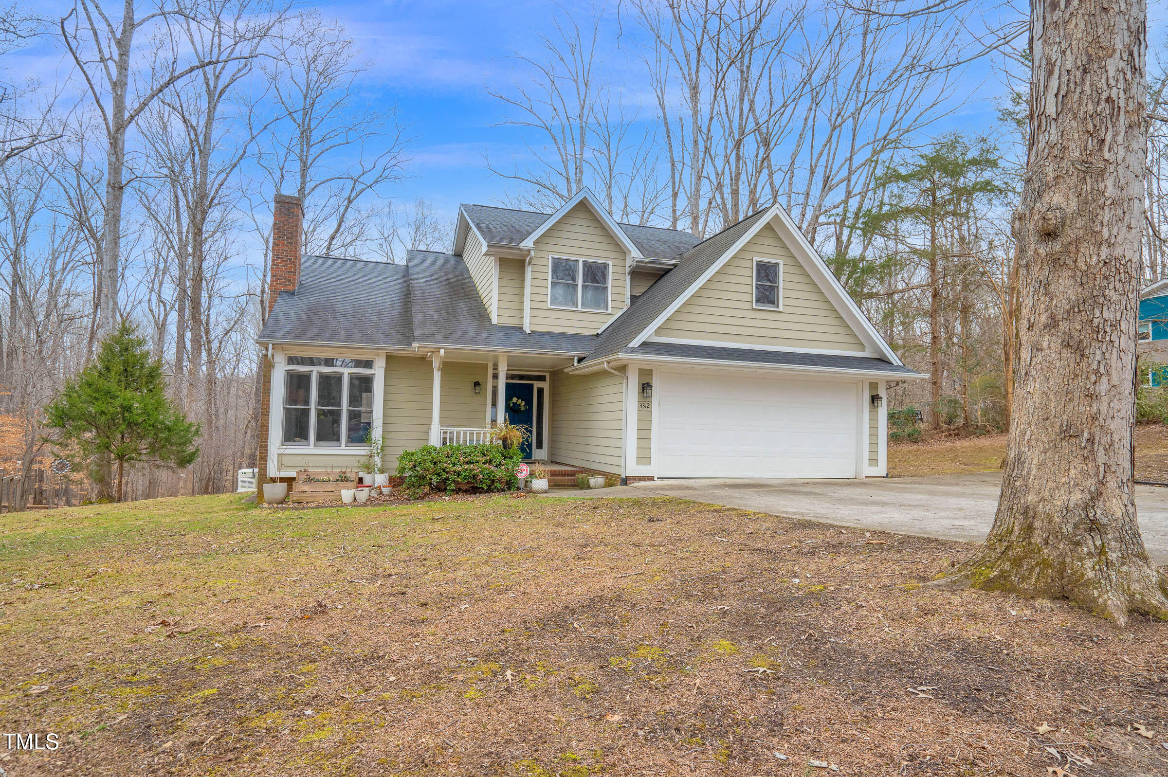 front view of a house with a yard