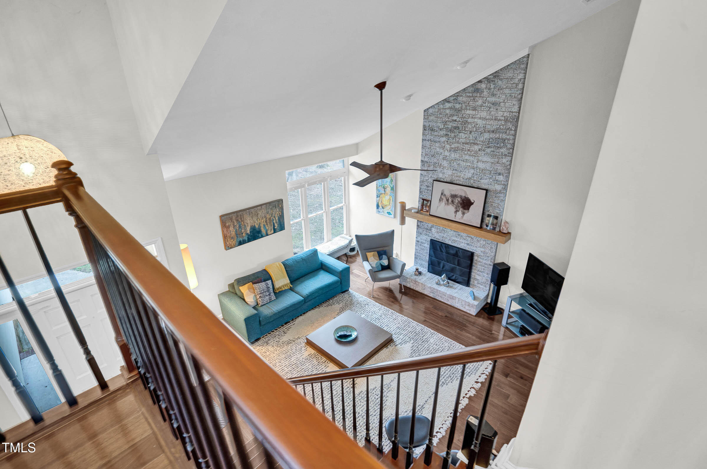 3312 Powers Lane Durham, NC 27712 - Photo 13 of 28 a view of a living room with furniture and a fireplace