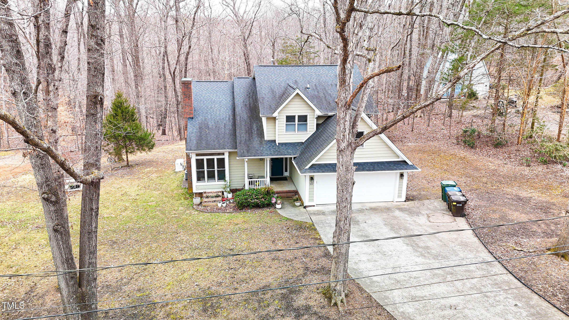 3312 Powers Lane Durham, NC 27712 - Photo 26 of 28 a front view of a house with a yard