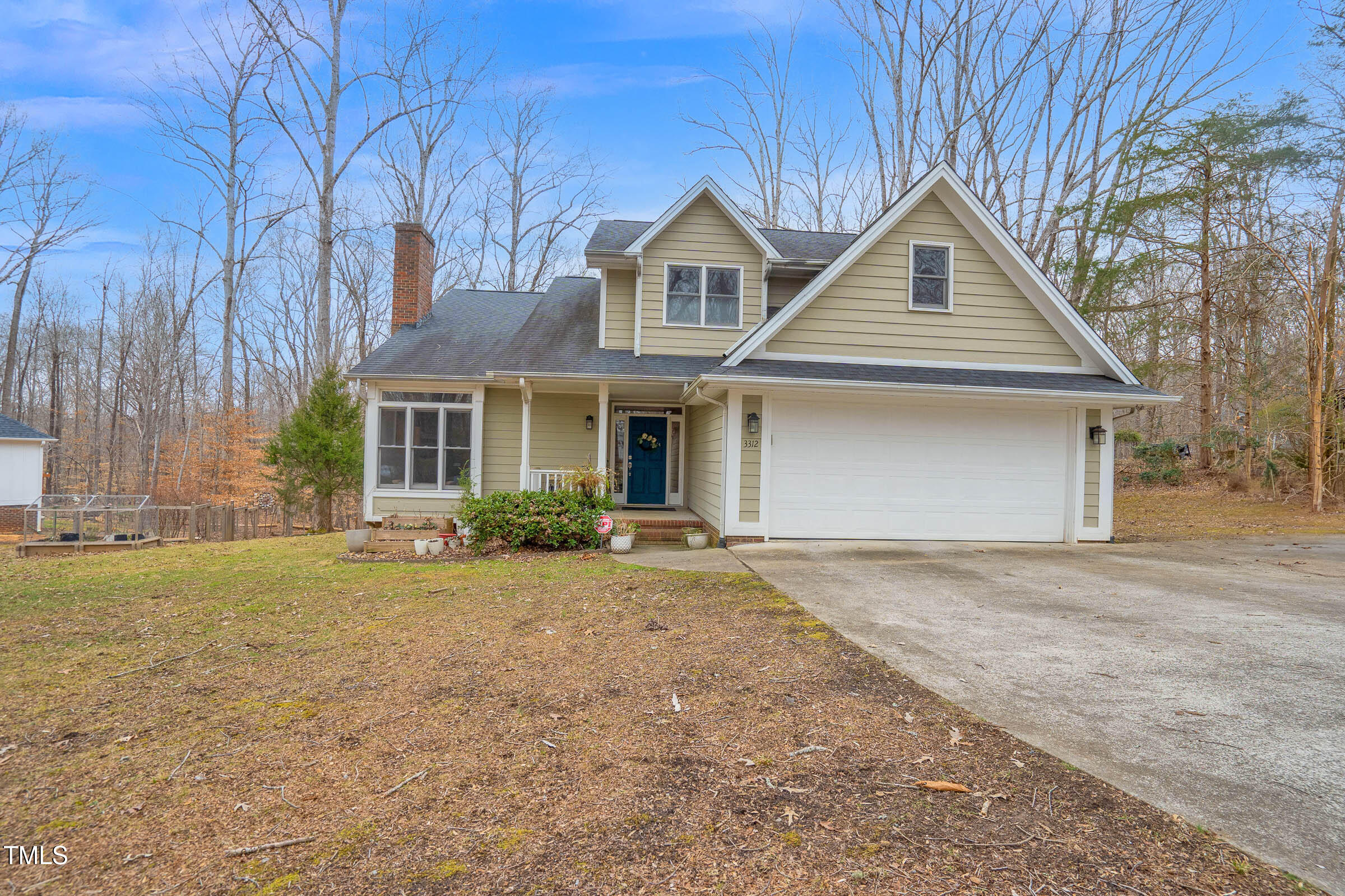 3312 Powers Lane Durham, NC 27712 - Photo 28 of 28 front view of a house and a yard