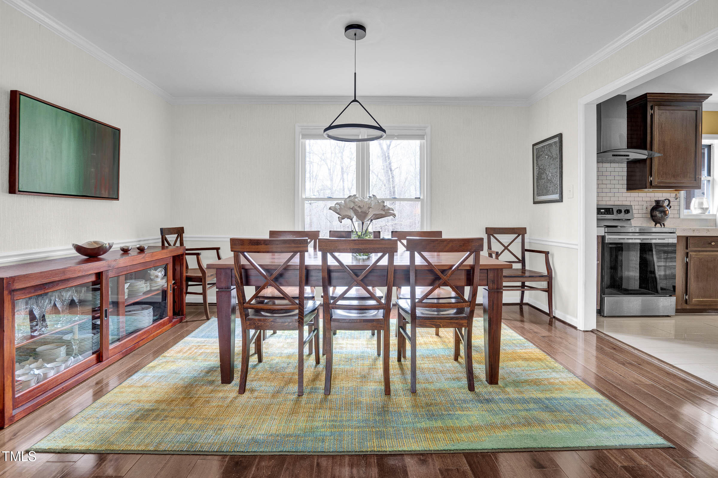3312 Powers Lane Durham, NC 27712 - Photo 5 of 28 a view of a dining room with furniture window and wooden floor