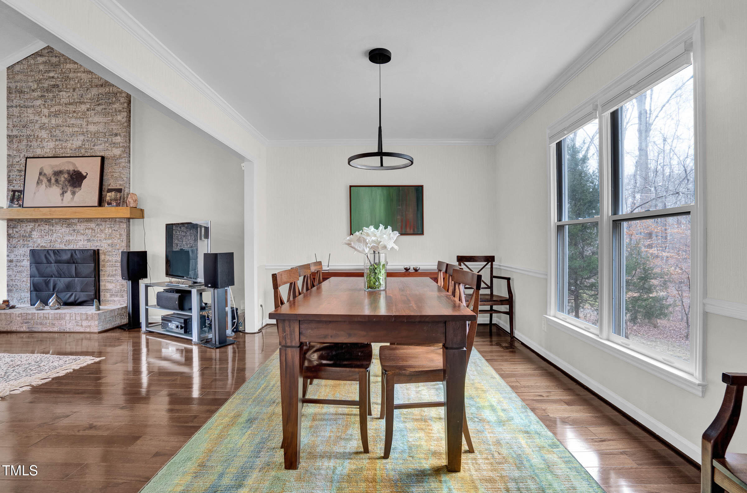 3312 Powers Lane Durham, NC 27712 - Photo 6 of 28 a dining room with furniture window wooden floor