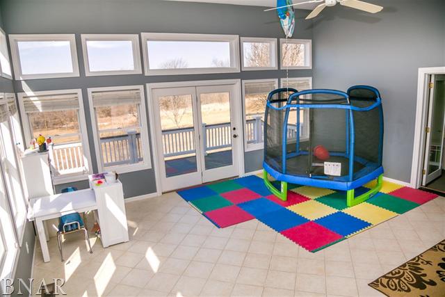 21192 North 500th Road East Benson, IL 61516 - Photo 11 of 30 a room that has a bed and a table in it