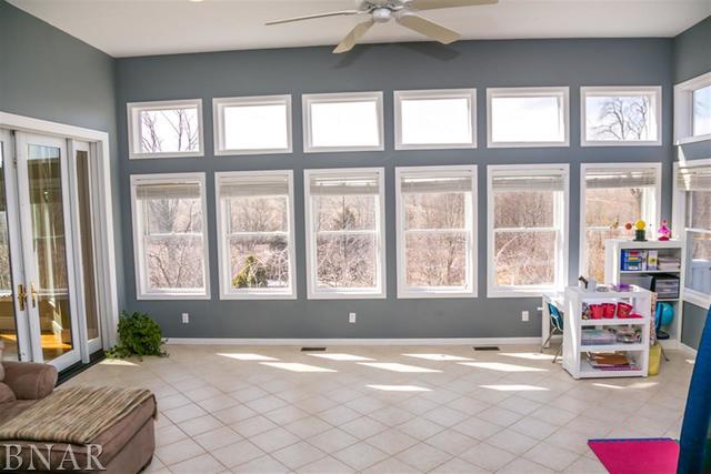 21192 North 500th Road East Benson, IL 61516 - Photo 12 of 30 a living room filled with furniture and a large window