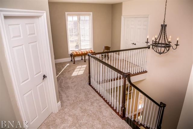 21192 North 500th Road East Benson, IL 61516 - Photo 14 of 30 a view of a hallway with wooden floor and stairs
