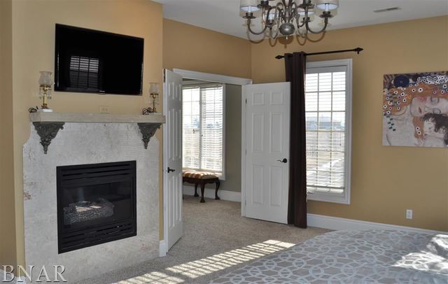 21192 North 500th Road East Benson, IL 61516 - Photo 20 of 30 a living room with furniture and a fireplace