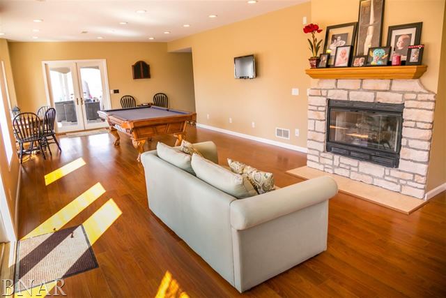 21192 North 500th Road East Benson, IL 61516 - Photo 22 of 30 a living room with furniture and a fireplace