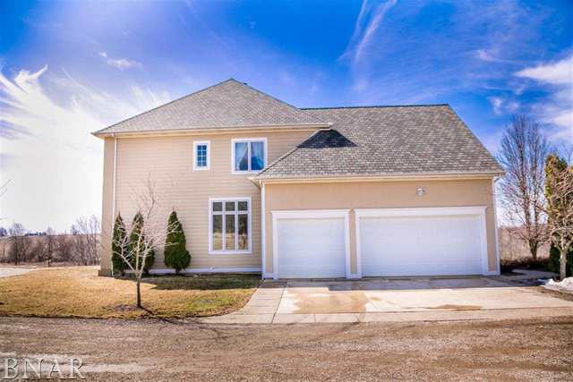21192 North 500th Road East Benson, IL 61516 - Photo 4 of 30 a front view of a house with a garden