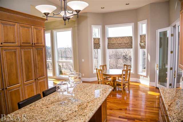 21192 North 500th Road East Benson, IL 61516 - Photo 10 of 30 a living room with furniture large window and wooden floor