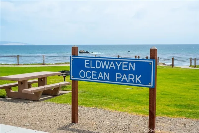 a sign that is on the side of a road