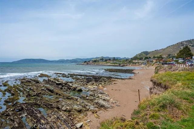 a view of a balcony with wooden floor