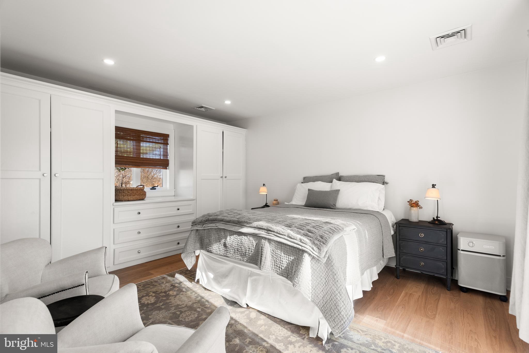723 Saylors Mill Road Spring City, PA 19475 - Photo 23 of 74 a spacious bedroom with a bed and a couch