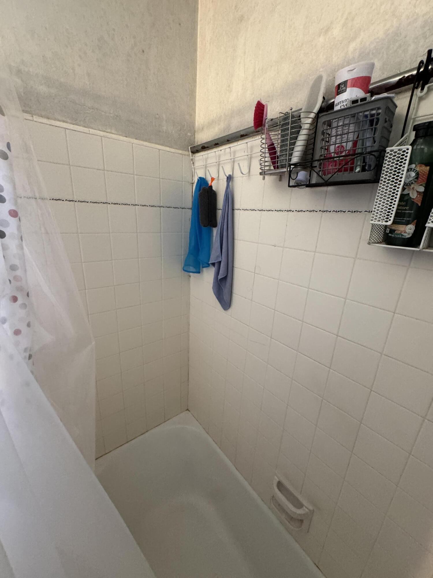 704 North Floral Street Visalia, CA 93291 - Photo 21 of 51 a bathroom with a shower
