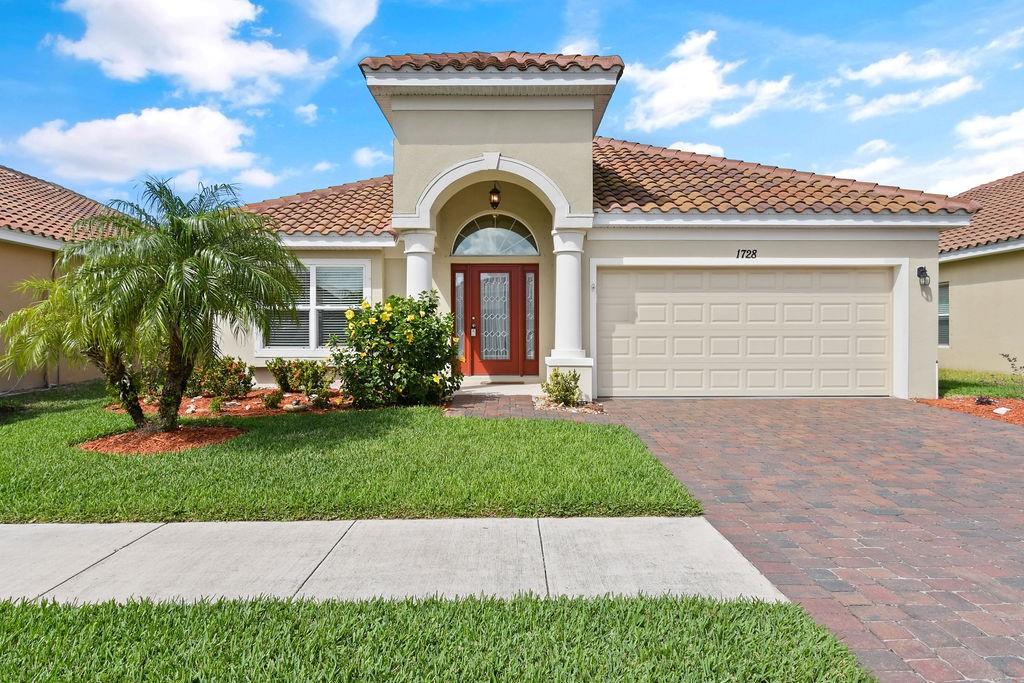 a view of a house with garden