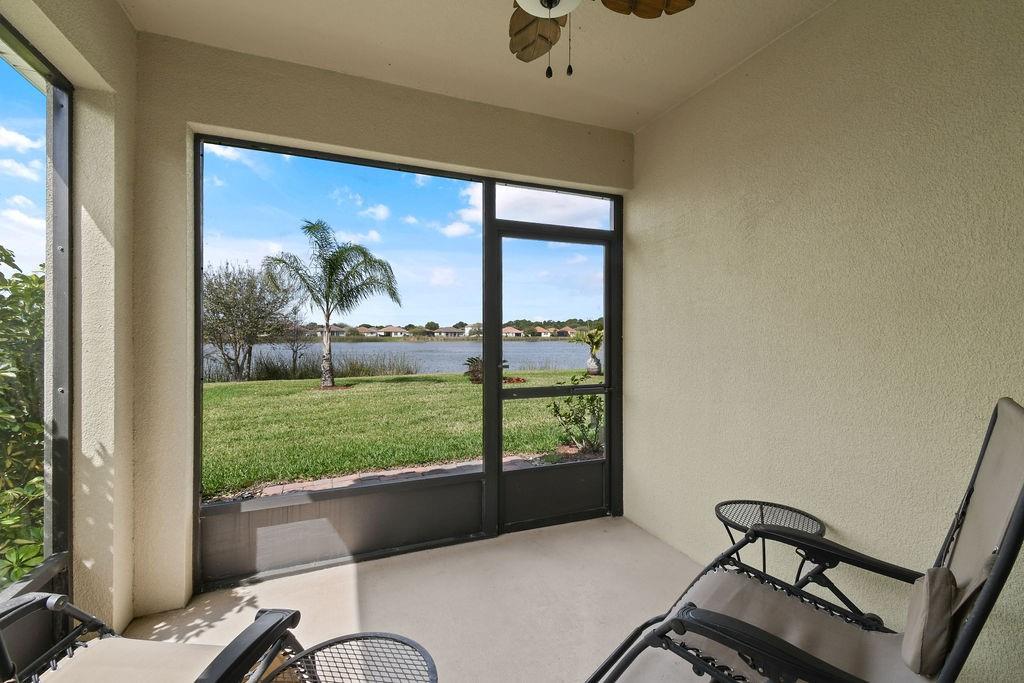 1728 Berkshire Circle Southwest Vero Beach, FL 32968 - Photo 32 of 36 a living room with furniture and a window