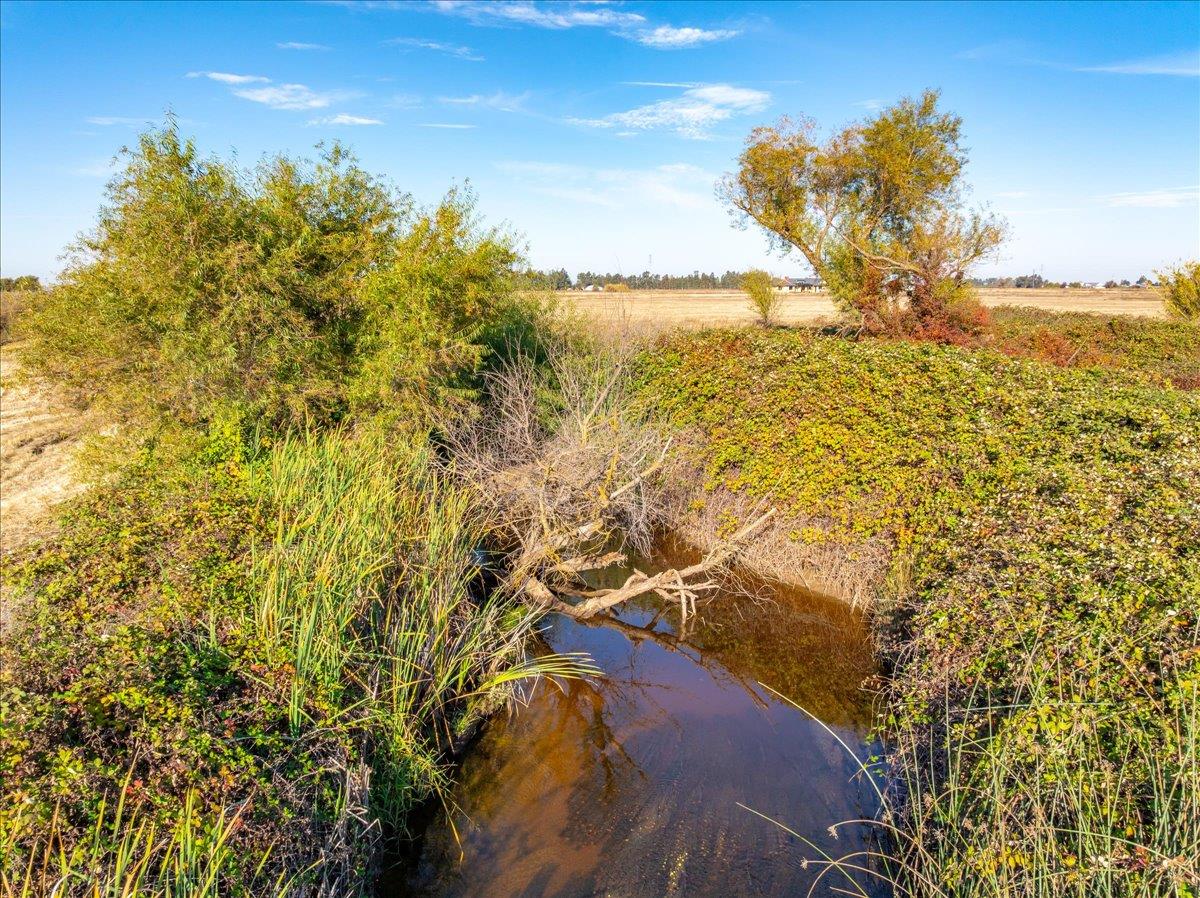 0 Westland Road Lincoln, CA 95648 - Photo 8 of 32 a view of a lake with a yard