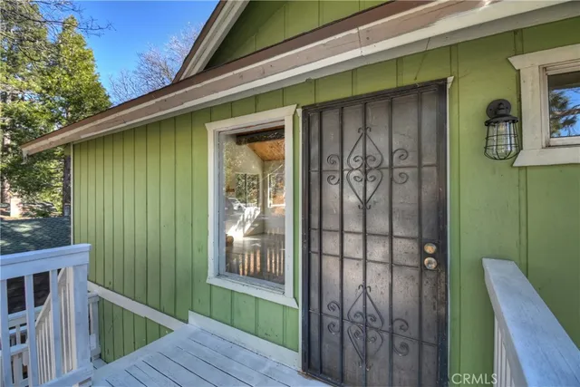 a view of entryway with a wooden door
