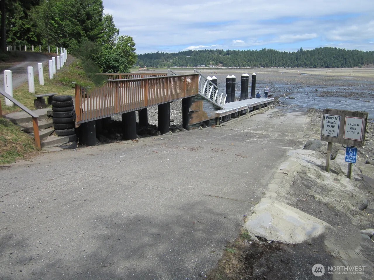 0 River Road Brinnon, WA 98320 - Photo 12 of 12 a view of a house with a yard and a large tree