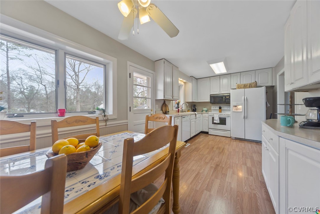 4210 Treely Road Chester, VA 23831 - Photo 11 of 39 a living room with stainless steel appliances furniture and a kitchen view