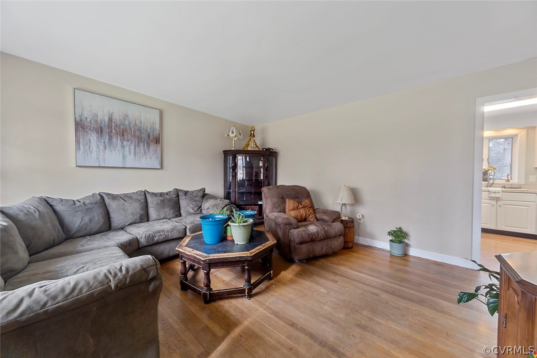 4210 Treely Road Chester, VA 23831 - Photo 13 of 39 a living room with furniture and wooden floor
