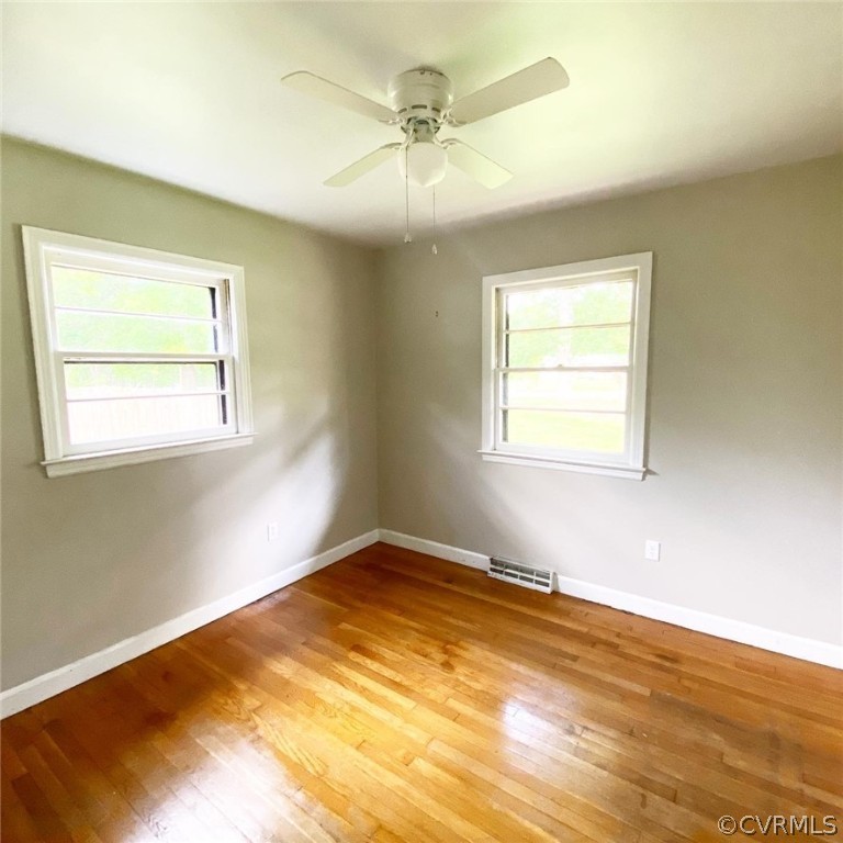 4210 Treely Road Chester, VA 23831 - Photo 21 of 39 a view of a room with wooden floor and a window