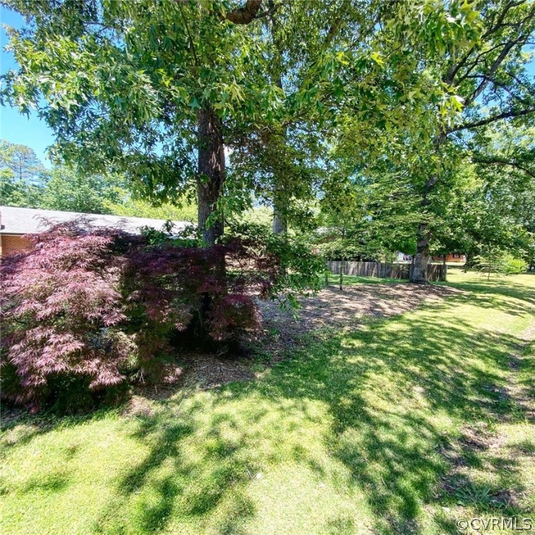 4210 Treely Road Chester, VA 23831 - Photo 27 of 39 a backyard of a house with lots of green space