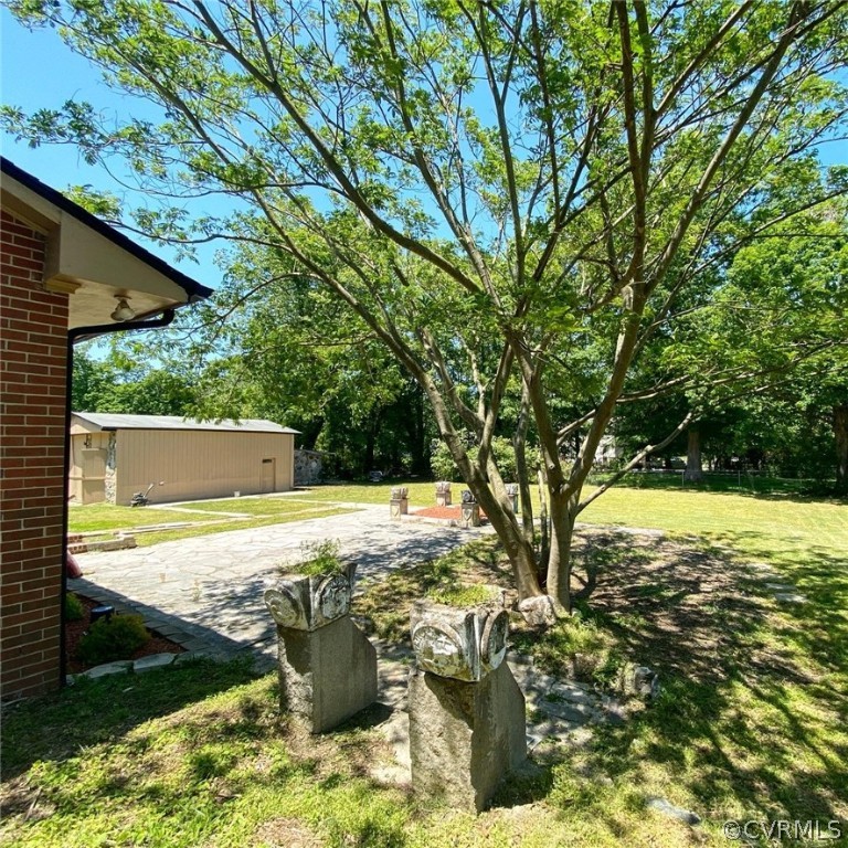 4210 Treely Road Chester, VA 23831 - Photo 28 of 39 a view of a yard with an outdoor space