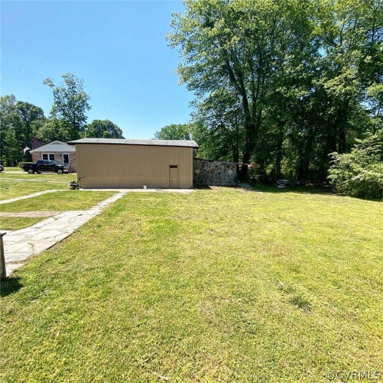 4210 Treely Road Chester, VA 23831 - Photo 35 of 39 a view of an outdoor space and swimming pool